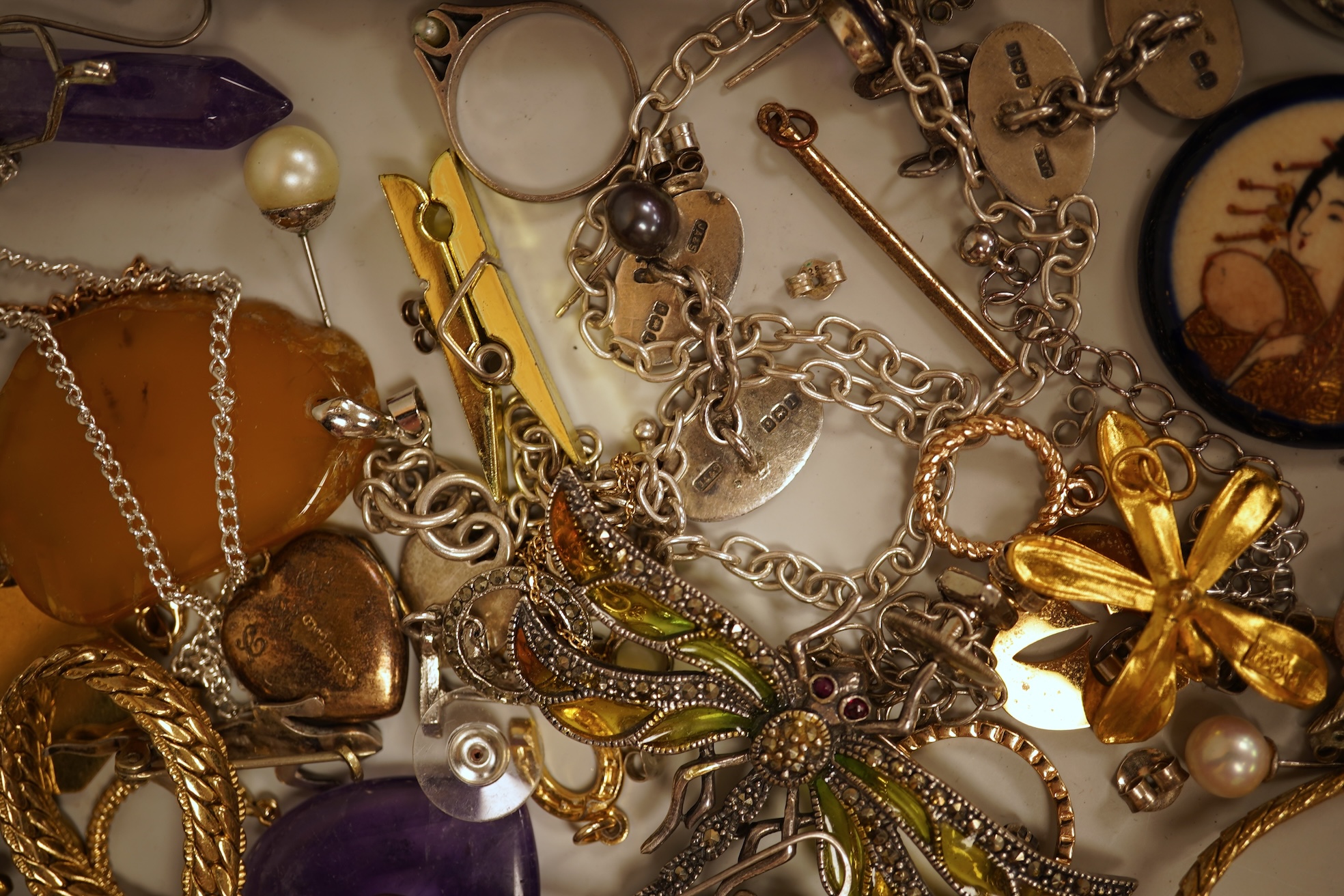 A small collection of assorted costume jewellery and other items including a cut steel shoe buckle, bracelets, chains, pair of silver and enamel oval cufflinks, etc.